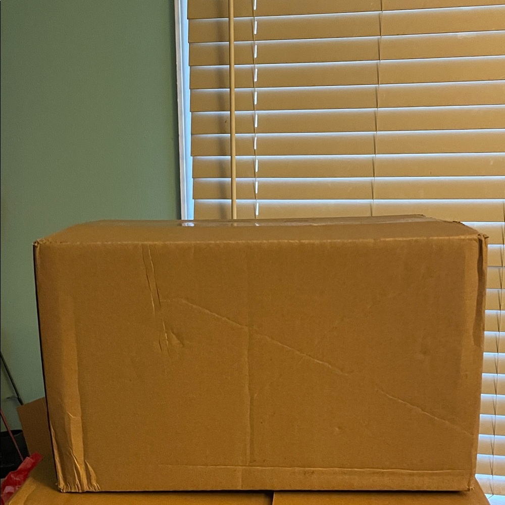 Large Brown Cardboard Box filled with DVDs